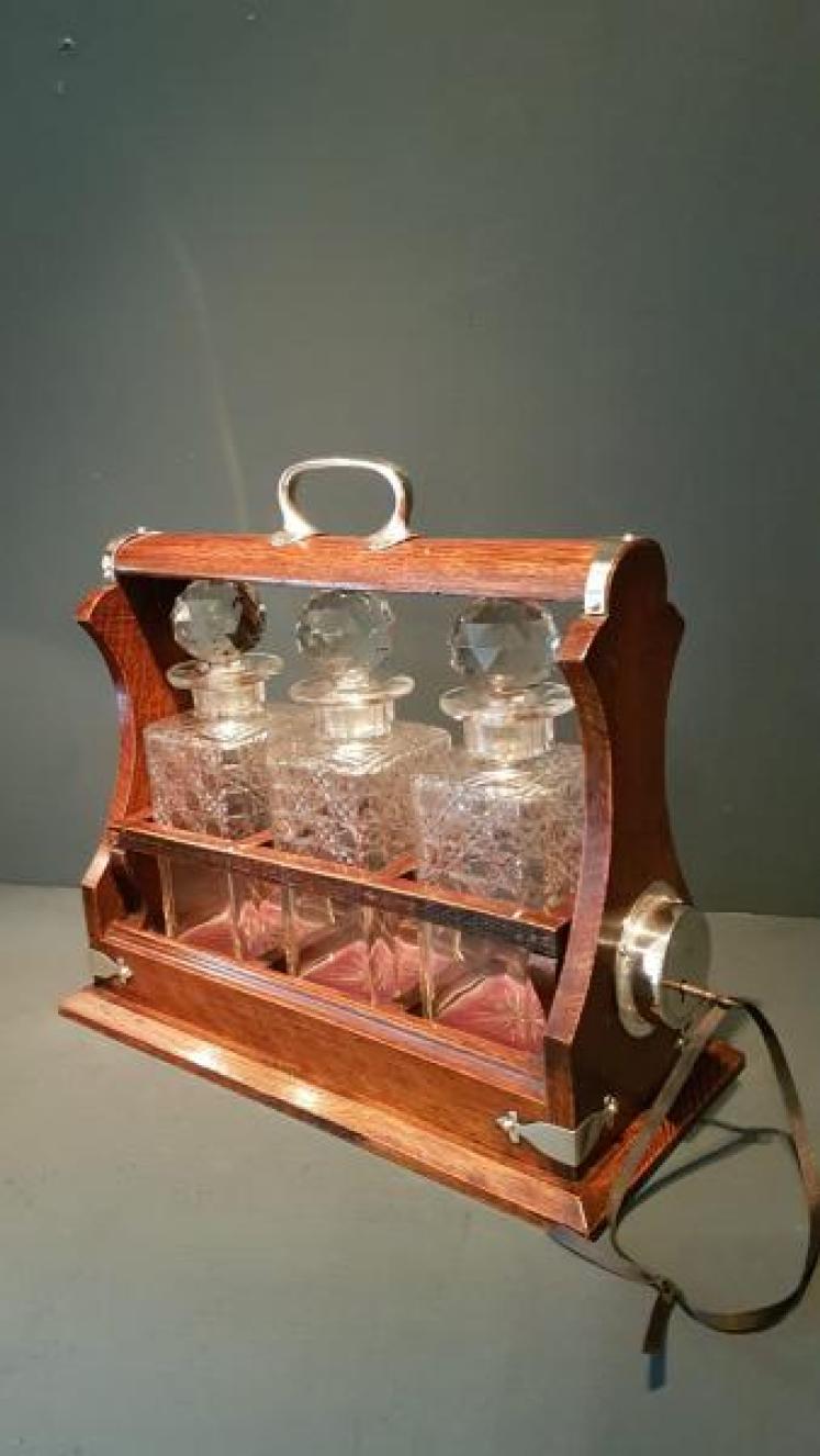 Victorian Oak and Silver Plate Three Bottle Tantalus - Image 1