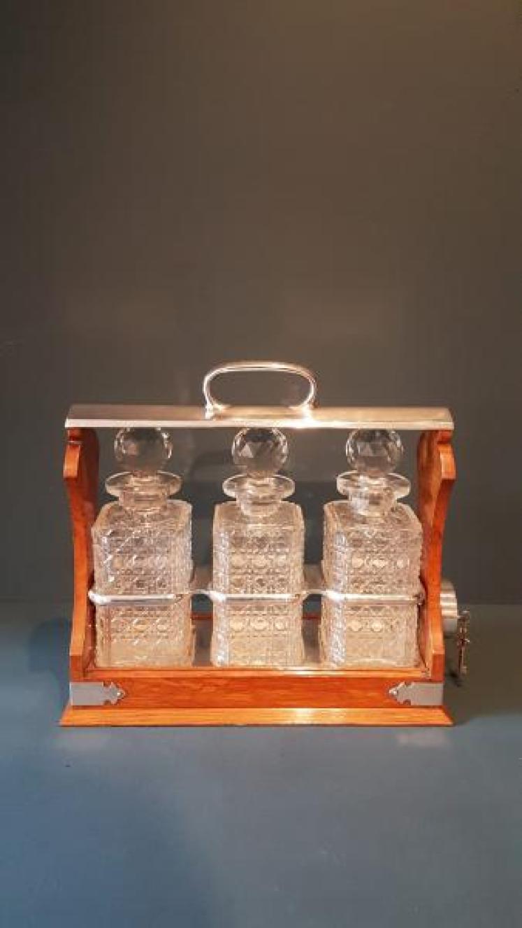Victorian Oak and Silver Plate Three Bottle Tantalus - Image 1