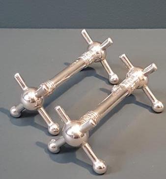 Matching Pair of Solid Silver Knife Rests