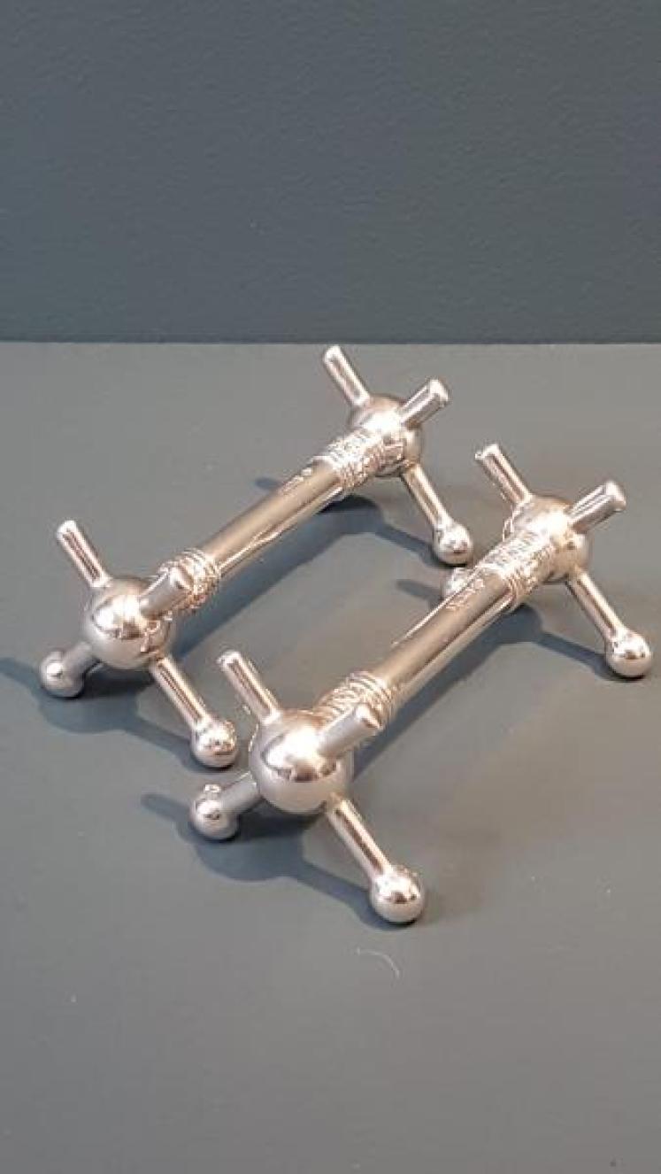 Matching Pair of Solid Silver Knife Rests - Image 1