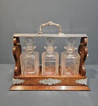 Immaculate Edwardian Oak and Silver Plated 3 Bottle Tantalus