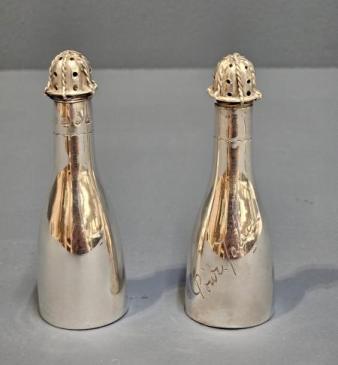 Pair of silver Victorian Champagne Bottle Peppers