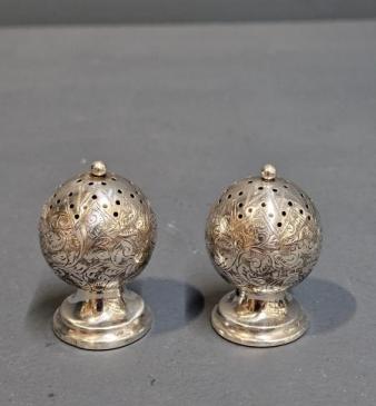 Pair of Engraved Silver Peppers