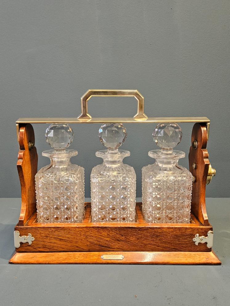 Victorian Oak and Silver Plated Three Bottle Tantalus - Image 1