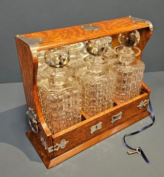 Victorian Oak and Silver Plated Three Bottle Tantalus 