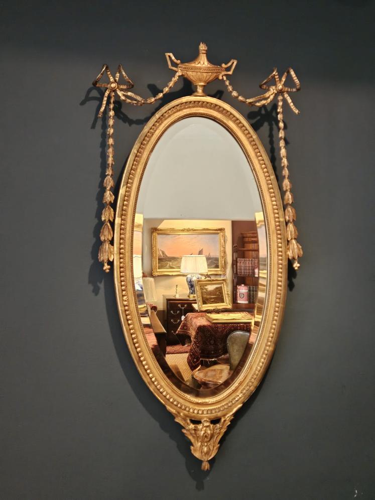 Victorian Oval Timber Gilt Mirror with Urn Top Pediment - Image 1