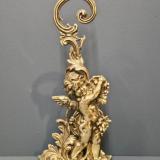 Antique Cherub Door Stop at Sturmans Antiques metalware for sale