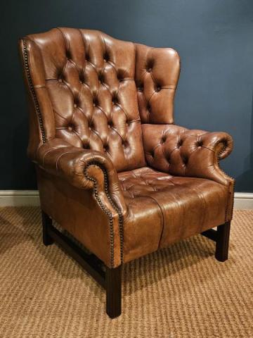 Antique 1920's Tan Hide Wing Back Arm Chair at Sturmans Antiques furniture for sale 