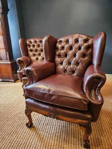 Antique Pair of Carved Walnut Framed Leather Wing Back Arm Chairs at Sturmans Antiques furniture for sale